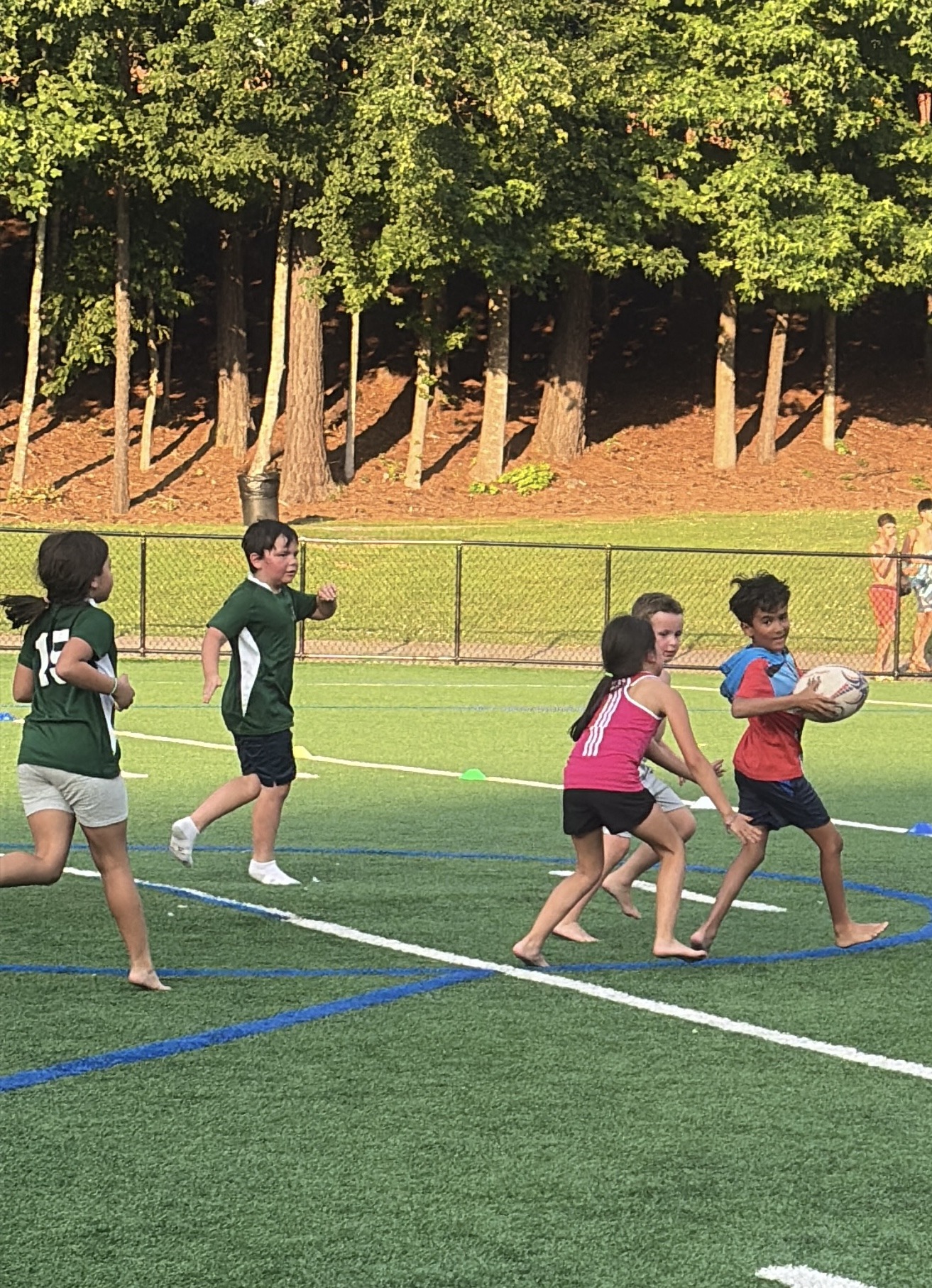 Rebels Rugby youth players at Roswell Area Park