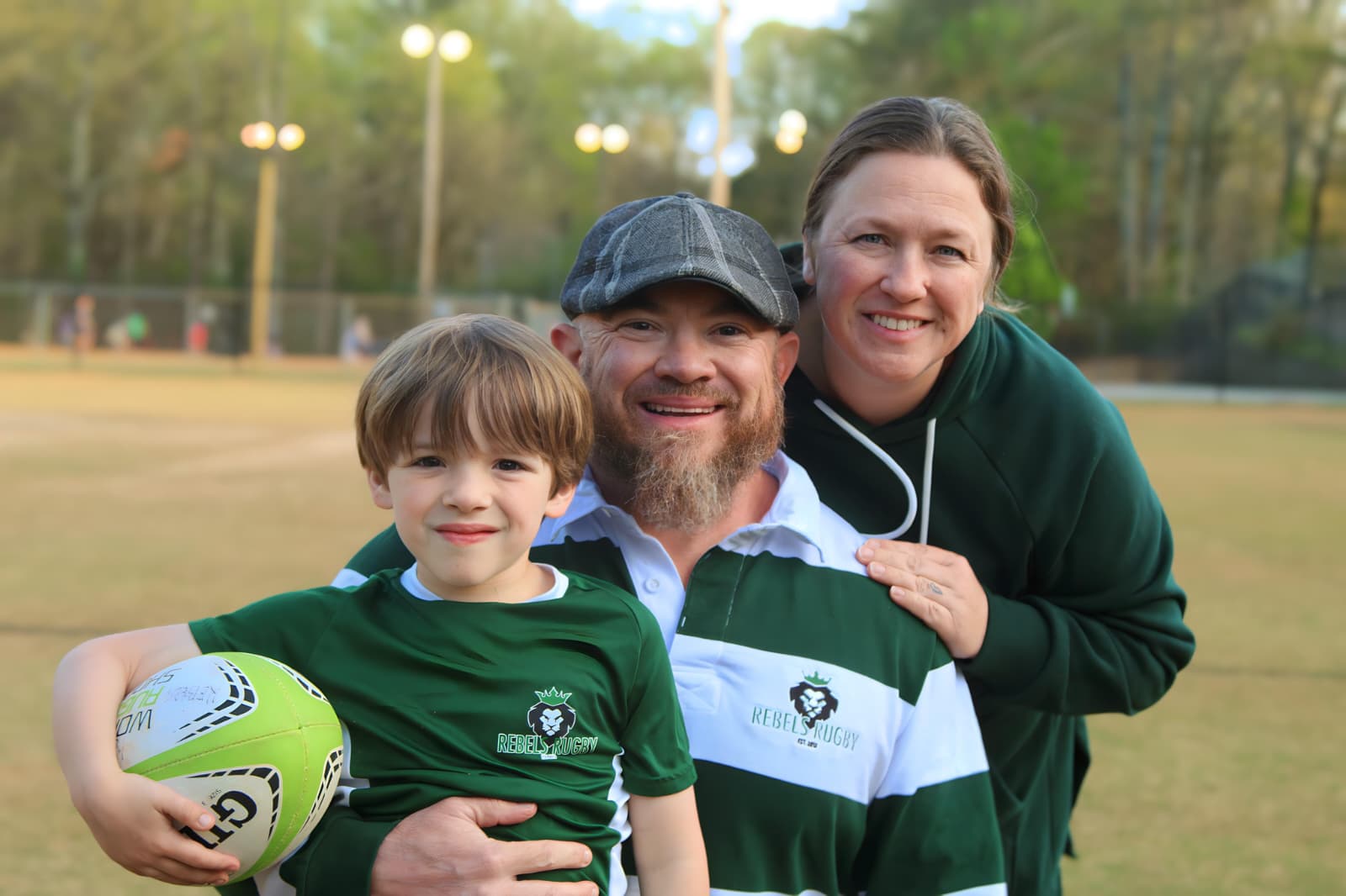 Joshua Porter with his family at the Rebels Rugby field