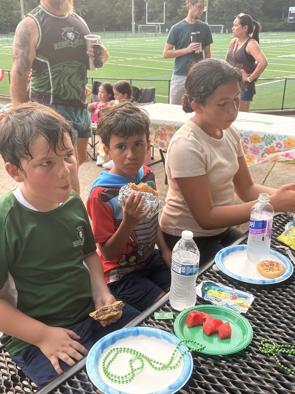 Rebels families sharing food at the Celebration BBQ